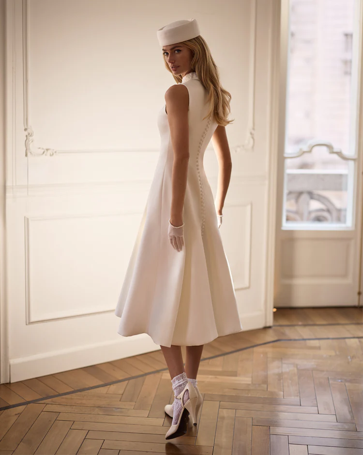 Elegant white midi dress with a high neckline - Image 3