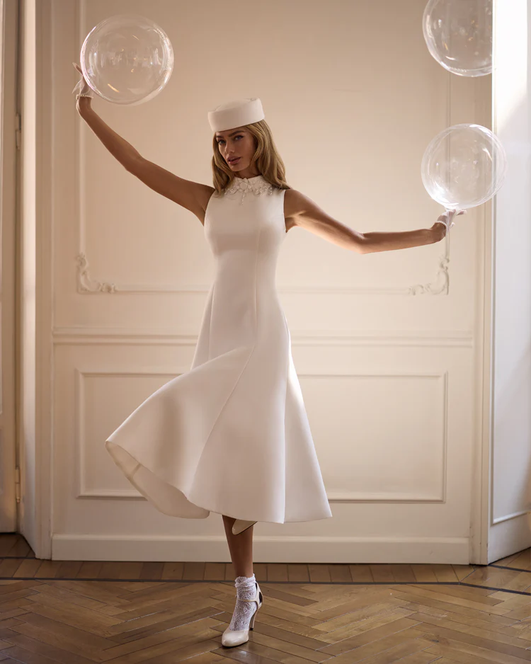 Elegant white midi dress with a high neckline - Image 5